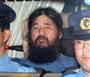 １９９５年９月、移送される松本智津夫死刑囚＝警視庁